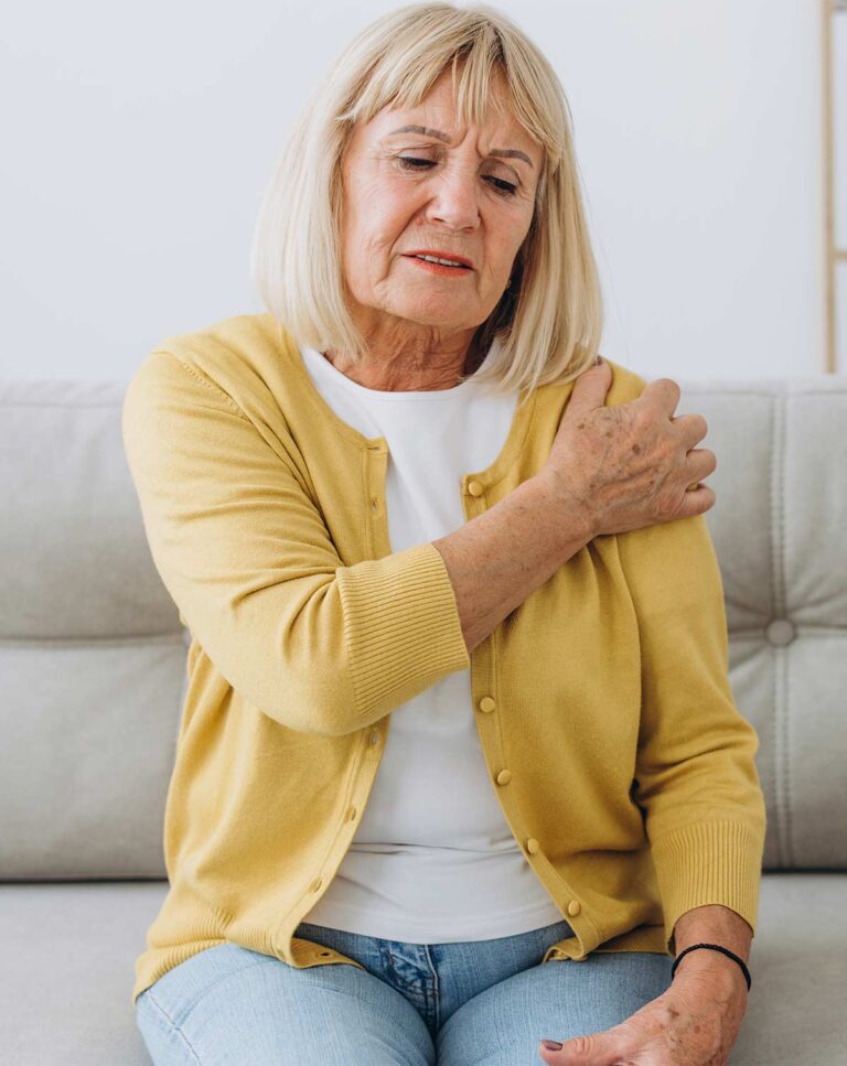 Person experiencing shoulder pain